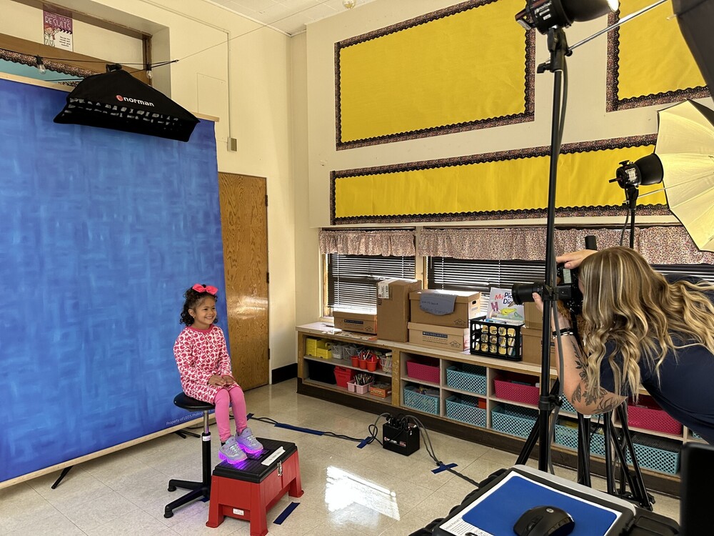 Student gets photo taken on picture day.