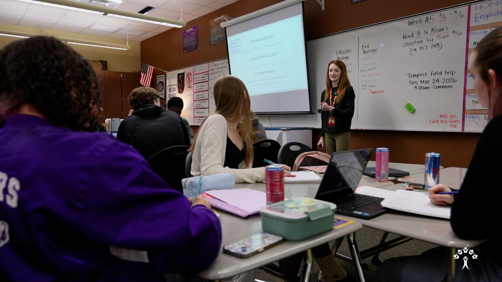 Rogers students learn language and composition from a teacher