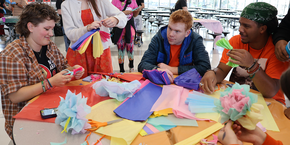 North Central High School students make paper flowers.