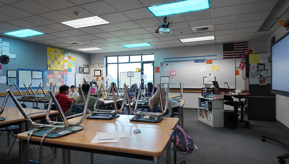 Students work in a classroom after school.