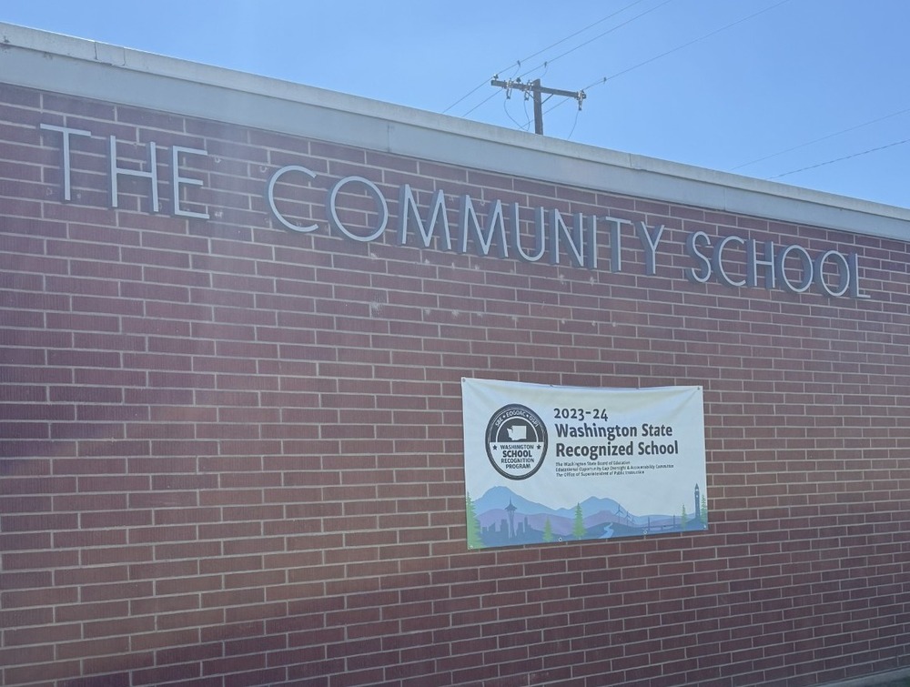 WA State Recognized School Banner hanging on outside of school