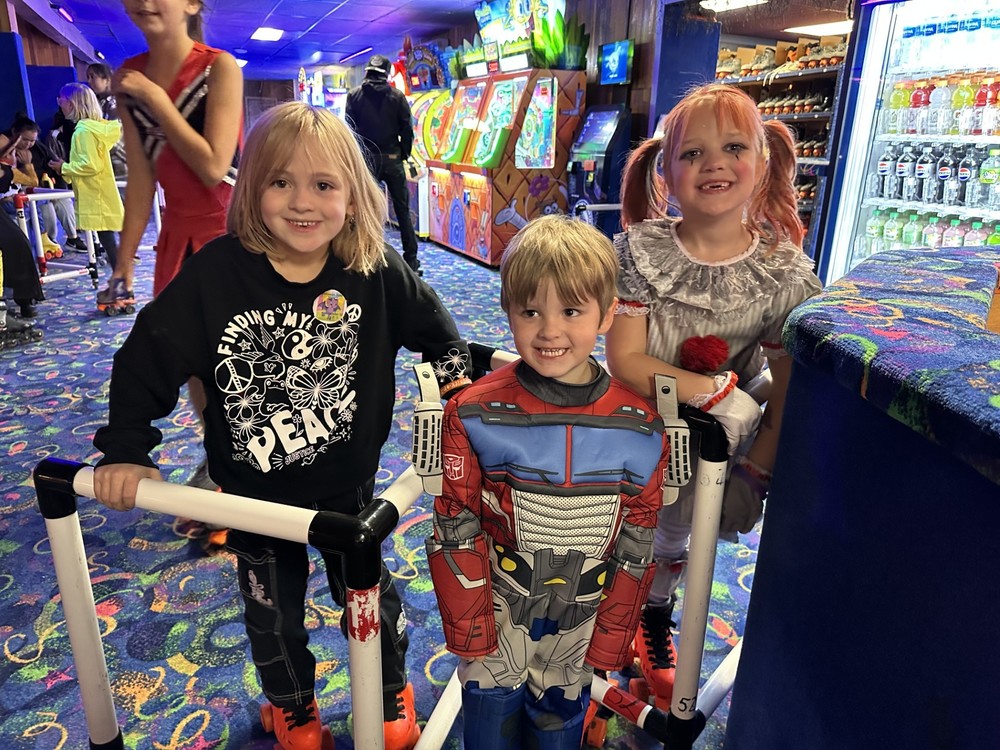 Kids at Skate Night in costumes