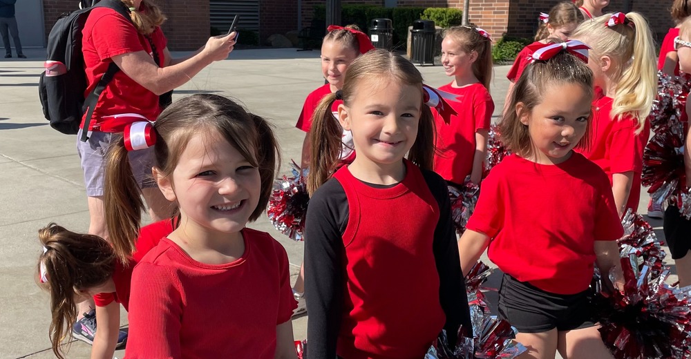 Students Holding Pompoms
