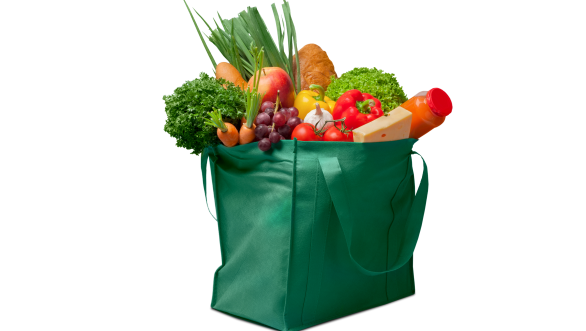 Grocery bag full of fruits and vegetables