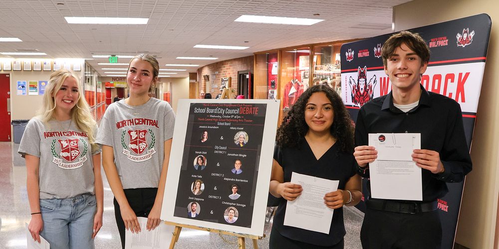 North Central students greet visitors for a candidate forum for Spokane Public Schools Board of Directors and Spokane City Council.