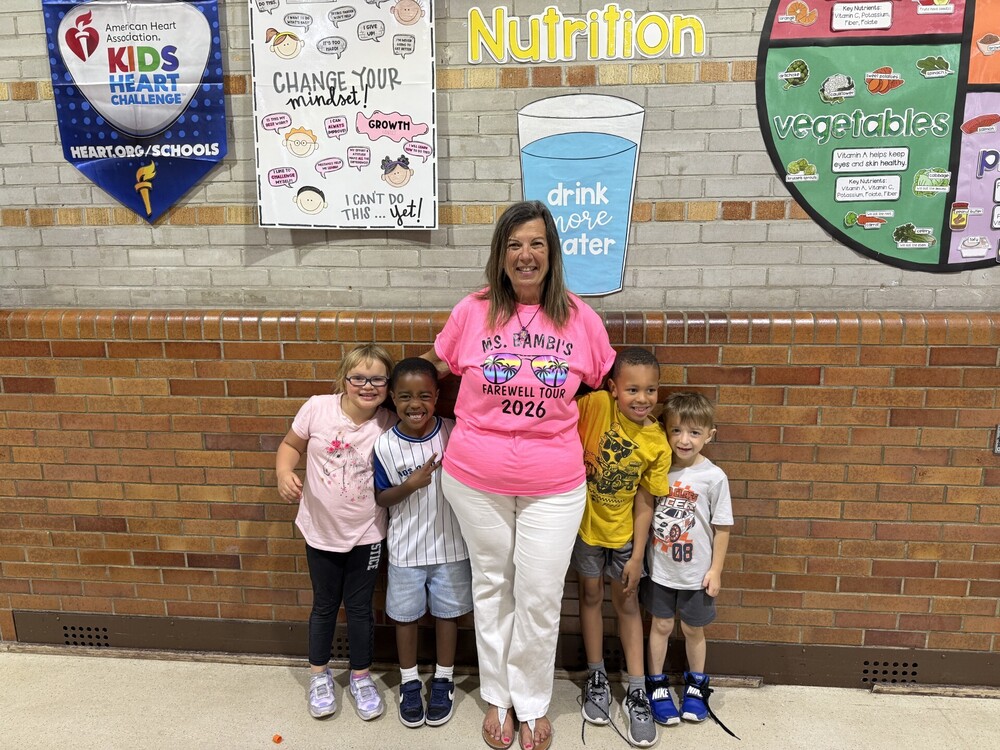Ms. Bambi with 4 of her students