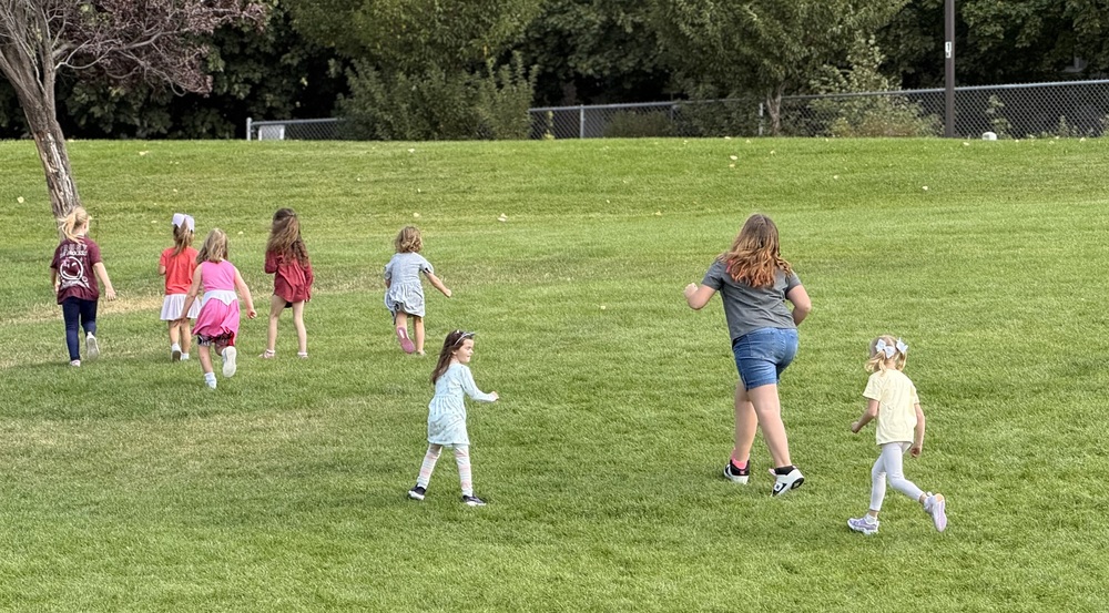 Students playing in the field