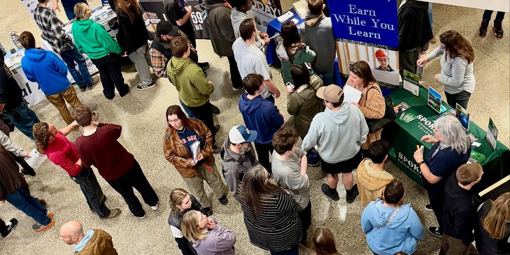 High school students and families learn about apprenticeships.
