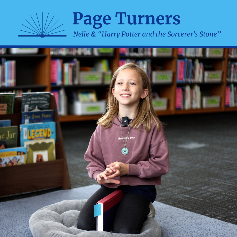 An elementary student smiles while seated with a book in a library and the text "Page Turners: Nelle & Harry Potter and the Sorcerer's Stone"
