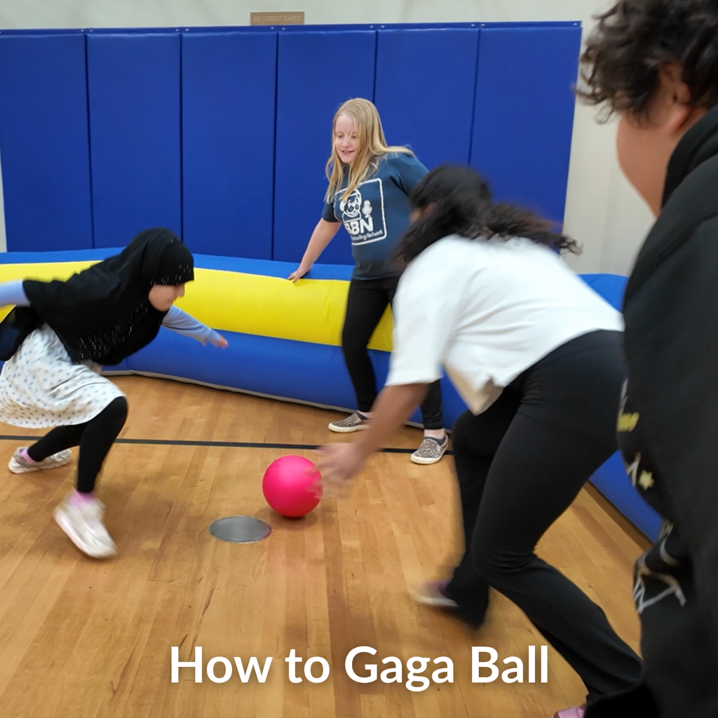 Elementary students play Gaga Ball in a school gym