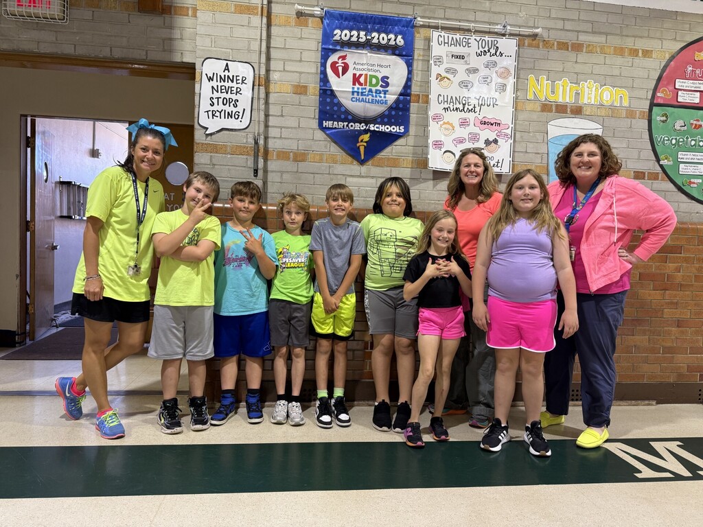 Students and staff wearing neon clothes for a spirit day.