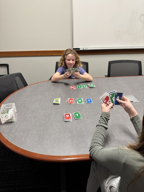 Kids playing Skip Bo
