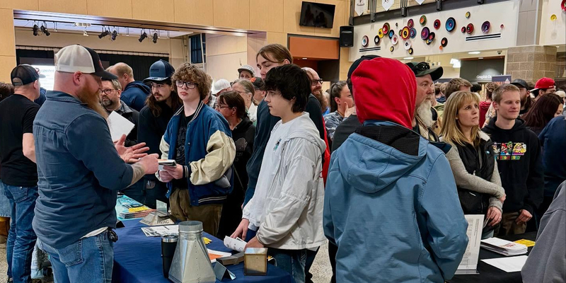 High school students and families learn about apprenticeships.