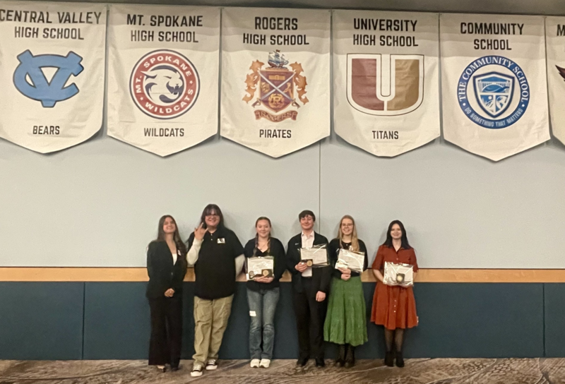 Rogers Spokane Scholars smile with their awards.
