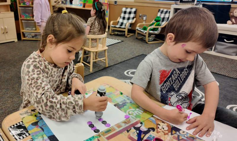 Preschoolers working on art