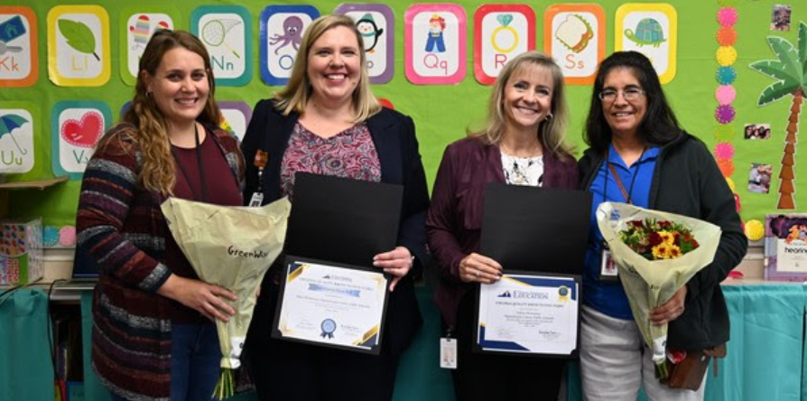 A picture of Mrs. Schwartz (our VPI teacher), our principal Ms. Schohn, and a rep from the state to give her award for achievement
