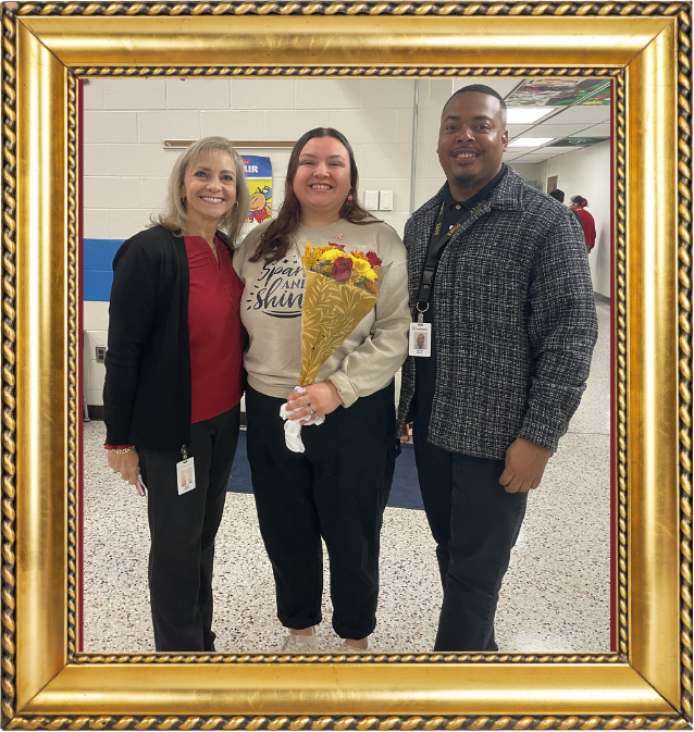 Picture of our teacher of the year with the admin team from Salem Elementary