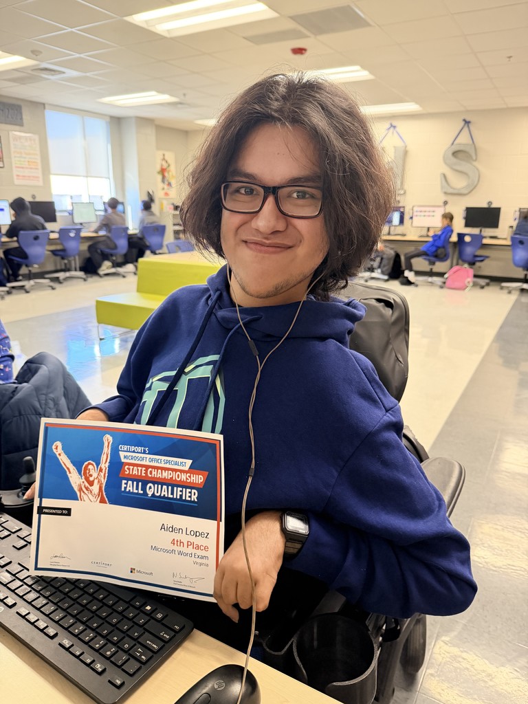 Photo of student, Aiden Lopez holding a certificate for the Commonwealth State Championship for Microsoft Word. He was awarded 4th place.