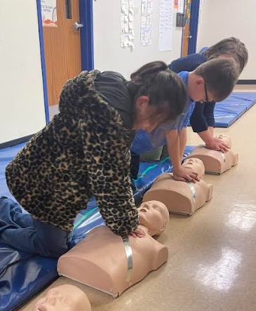 Students getting hands-on CPR training