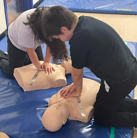 Students getting hands-on CPR training