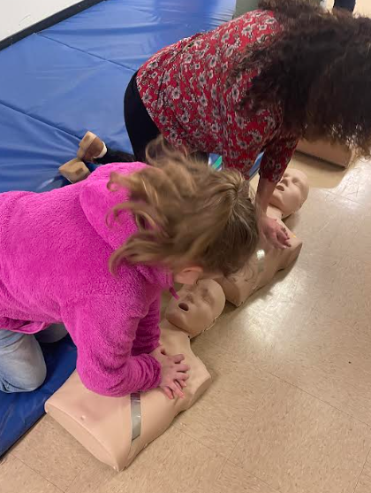 Students getting hands-on CPR training