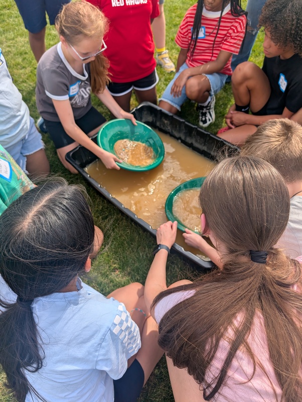 Students learn how to pan for gold