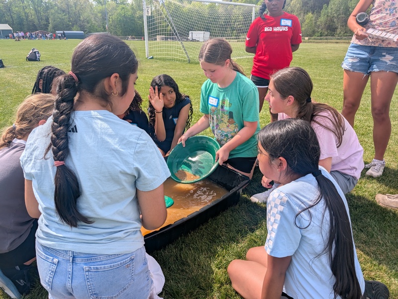 Students learn how to pan for gold