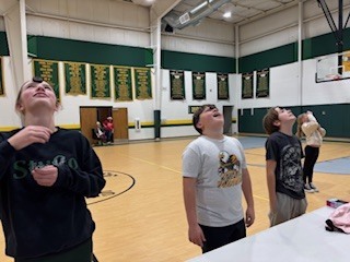 Middle school students enjoying minute to win it games