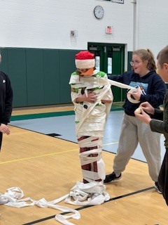 Middle school students enjoying minute to win it games