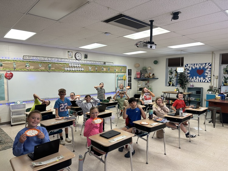 third grade eating marshmallows 