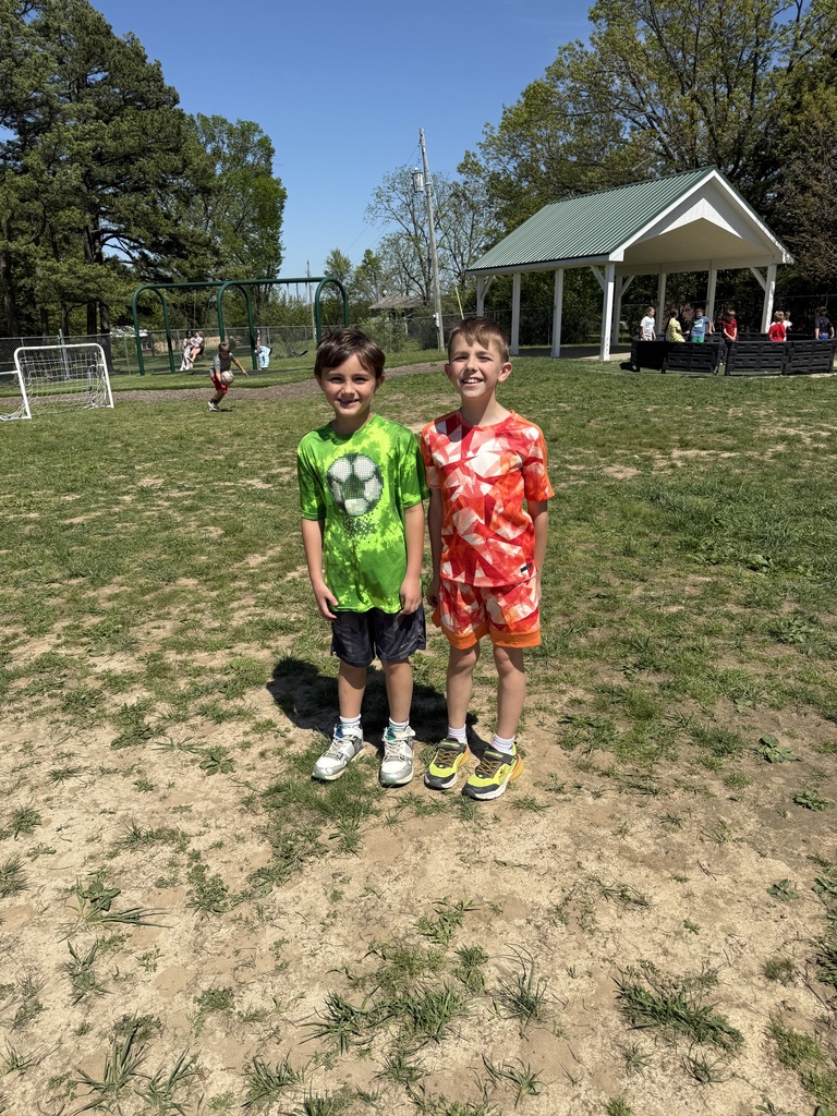 Kids on the play ground in bright colors for spirit week
