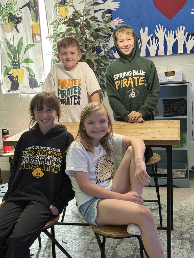 Kids wearing their school colors for the last day of Spirit week