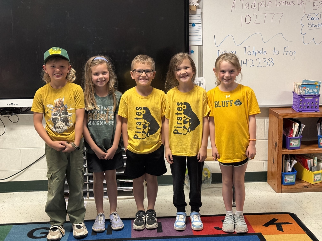 Kids wearing their school colors for the last day of Spirit week