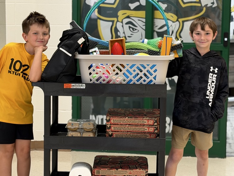 third grade boys wihh pizza and toys 