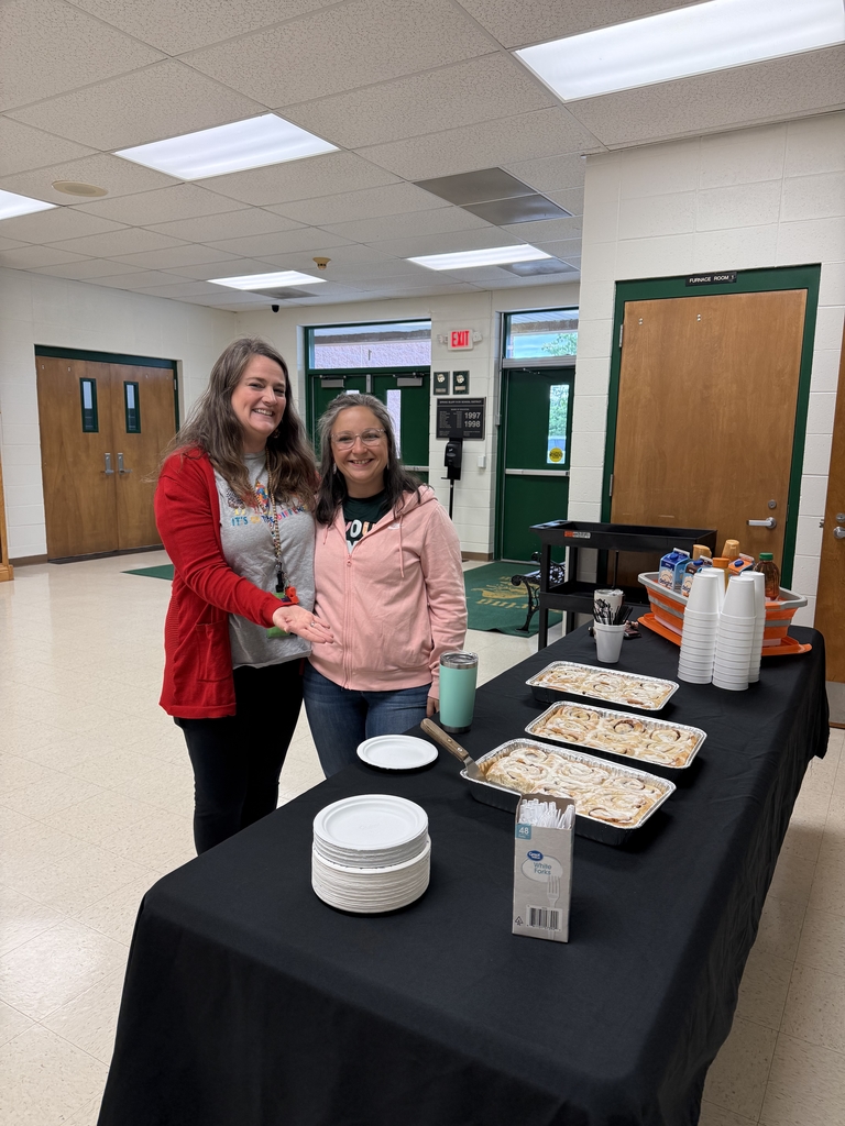 Teachers enjoying cinnamon rolls for teacher appreciation