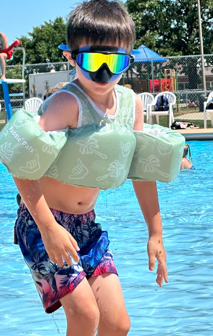 student in swim gear at the pool
