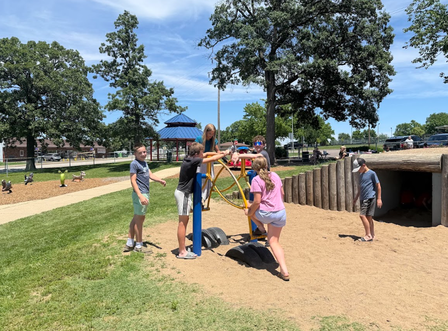 students playing at the park