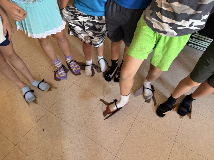 students made dinosaur feet