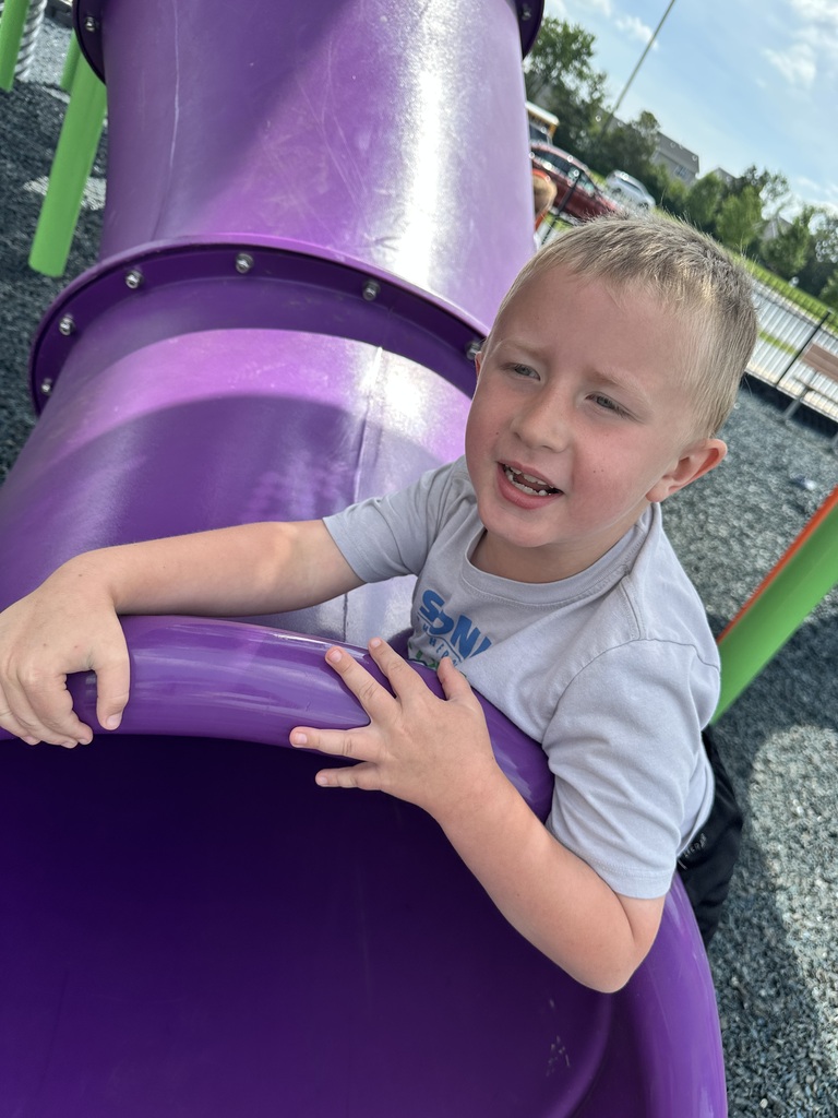 student on the slide