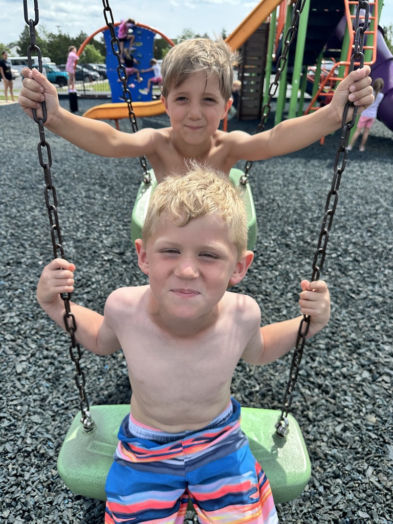 students playing at the park