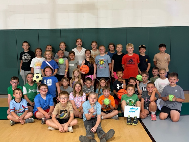 kids holding up glow in the dark stuff