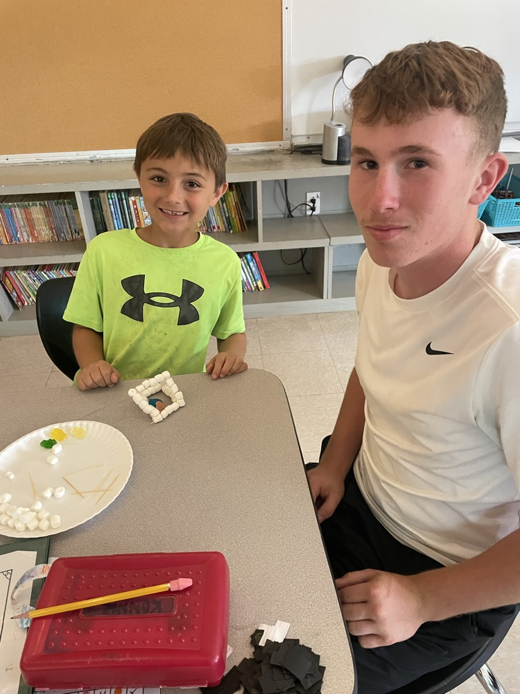 kids doing stem activity 