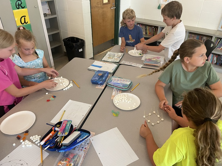 kids doing stem activity 