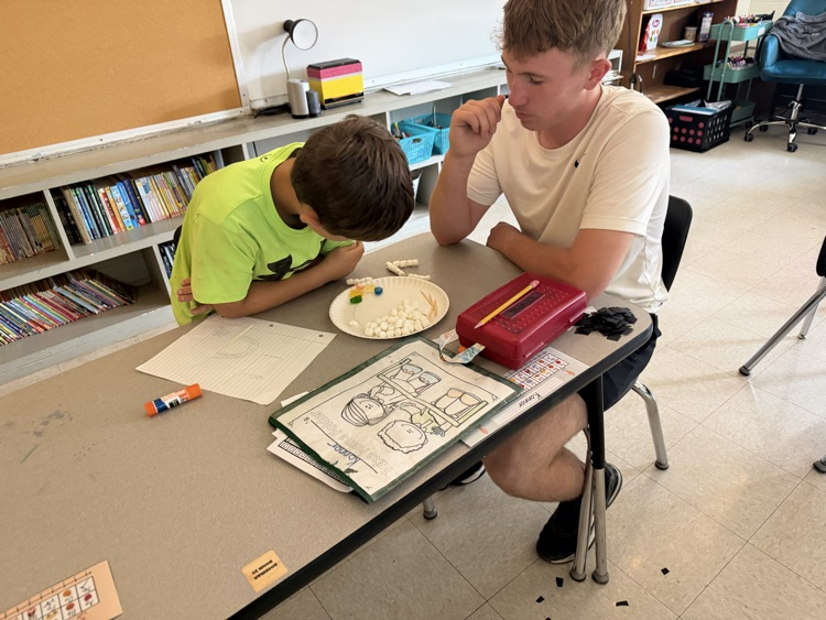 kids doing stem activity 