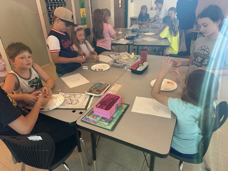 kids doing stem activity 