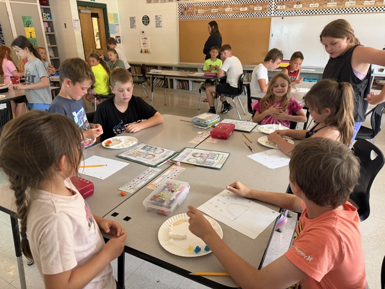 kids doing stem activity 