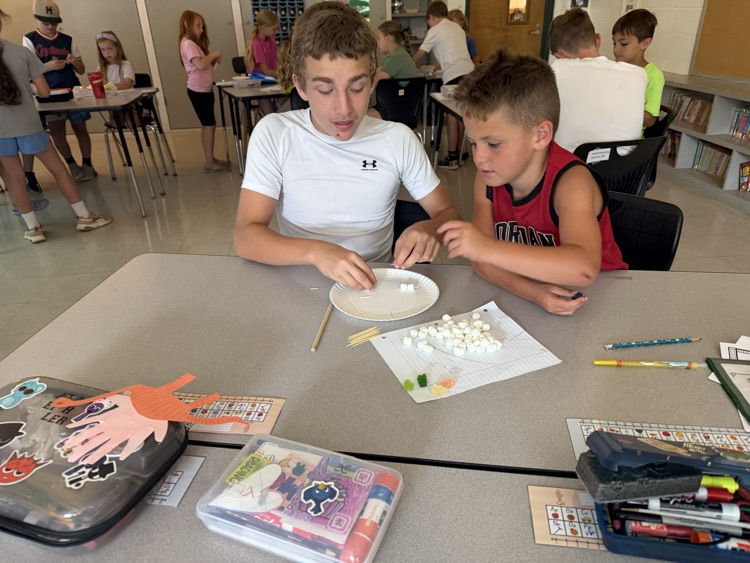 kids doing stem activity 