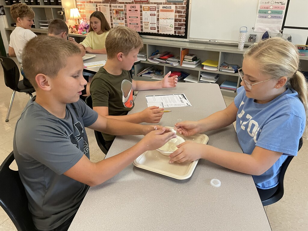 5th Grade Students exploring Goop to describe the states of matter.