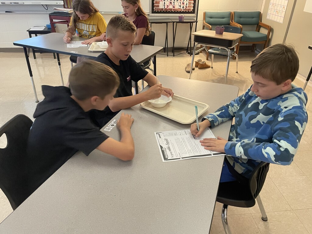 5th Grade Students exploring Goop to describe the states of matter.