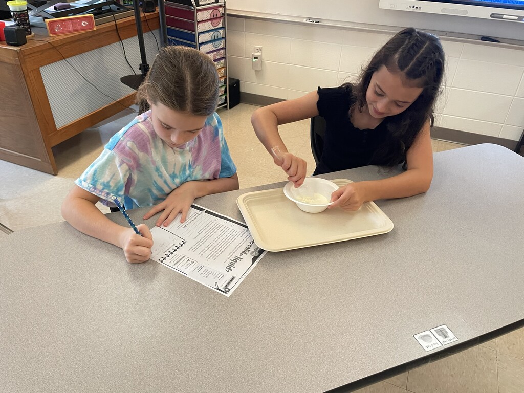 5th Grade Students exploring Goop to describe the states of matter.